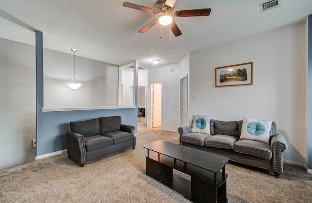 3203 Blaesser Dr, Pearland, TX 77584 - carpeted living room with ceiling fan and baseboards