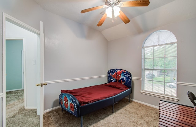 3203 Blaesser Dr, Pearland, TX 77584 - bedroom featuring carpet flooring, lofted ceiling, a ceiling fan, and baseboards