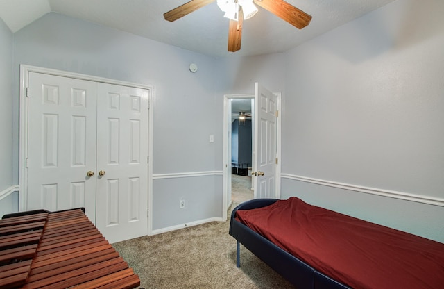 3203 Blaesser Dr, Pearland, TX 77584 - carpeted bedroom with lofted ceiling, a ceiling fan, baseboards, and a closet
