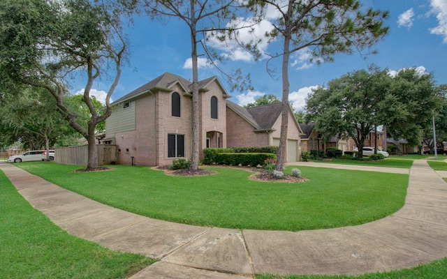 3203 Blaesser Dr, Pearland, TX 77584 - view of home's exterior featuring brick siding, driveway, and a garage