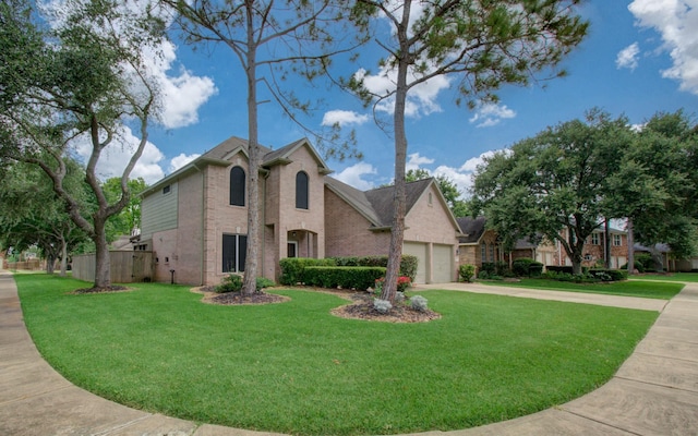 3203 Blaesser Dr, Pearland, TX 77584 - view of front facade featuring brick siding, concrete driveway, and an attached garage