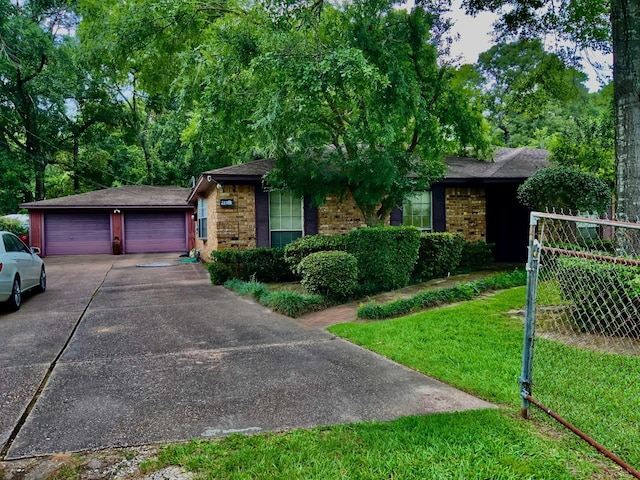 24360 Webb Rd, Porter, TX 77365 - ranch-style house with brick siding, a front yard, a detached garage, and a shingled roof