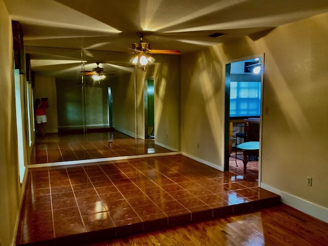 24360 Webb Rd, Porter, TX 77365 - spare room featuring tile patterned floors, baseboards, and ceiling fan