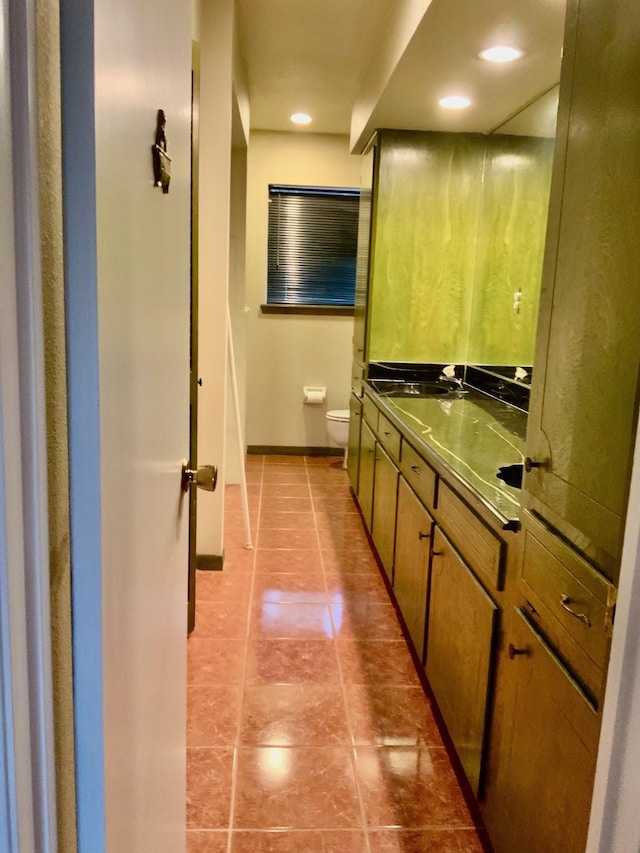 24360 Webb Rd, Porter, TX 77365 - full bathroom with toilet, double vanity, tile patterned flooring, baseboards, and recessed lighting
