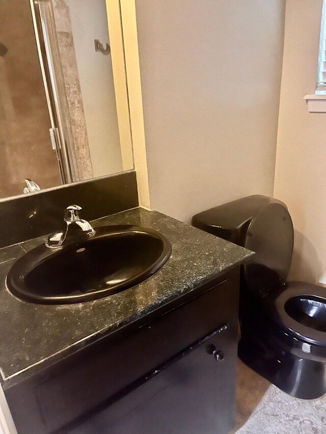 24360 Webb Rd, Porter, TX 77365 - bathroom with vanity and toilet