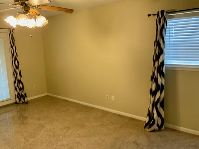 24360 Webb Rd, Porter, TX 77365 - spare room with a ceiling fan, carpet flooring, baseboards, and plenty of natural light