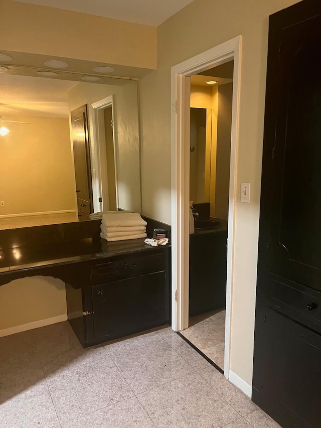 24360 Webb Rd, Porter, TX 77365 - bathroom with baseboards and vanity