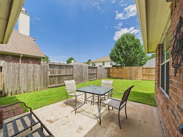 26940 Carriage Manor Ln, Kingwood, TX 77339 - view of patio featuring outdoor dining area