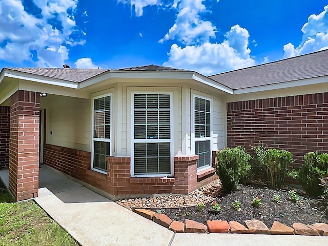 29375 Alba Rose Dr, Spring, TX 77386 - property entrance featuring brick siding and roof with shingles