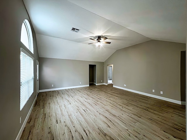 29375 Alba Rose Dr, Spring, TX 77386 - spare room with ceiling fan, wood finished floors, lofted ceiling, and baseboards
