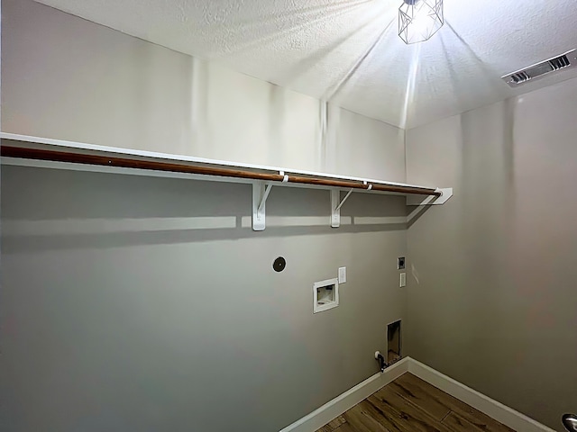 29375 Alba Rose Dr, Spring, TX 77386 - washroom with gas dryer hookup, wood finished floors, baseboards, hookup for a washing machine, and hookup for an electric dryer