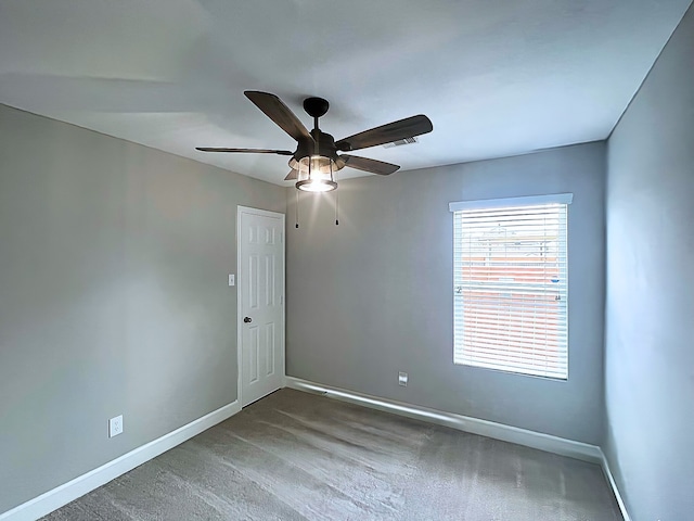 29375 Alba Rose Dr, Spring, TX 77386 - spare room featuring carpet floors, baseboards, and a ceiling fan