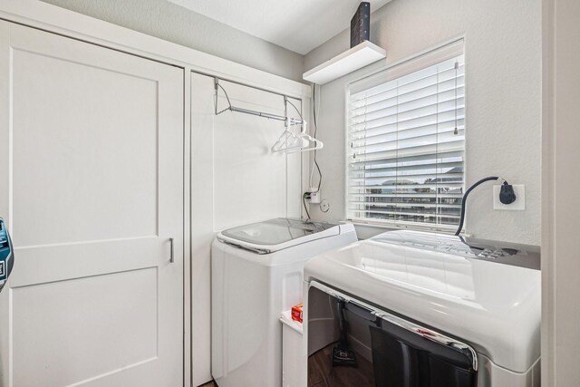 22212 Cantina Dr, Galveston, TX 77554 - washroom featuring washer and dryer