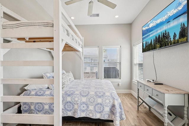 22212 Cantina Dr, Galveston, TX 77554 - bedroom featuring wood finished floors, a ceiling fan, and recessed lighting