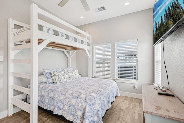 22212 Cantina Dr, Galveston, TX 77554 - bedroom with wood finished floors, a ceiling fan, and recessed lighting