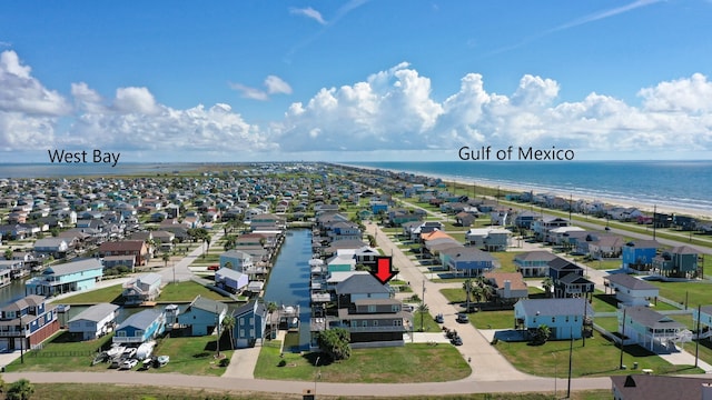 22212 Cantina Dr, Galveston, TX 77554 - aerial view of residential area with a large body of water