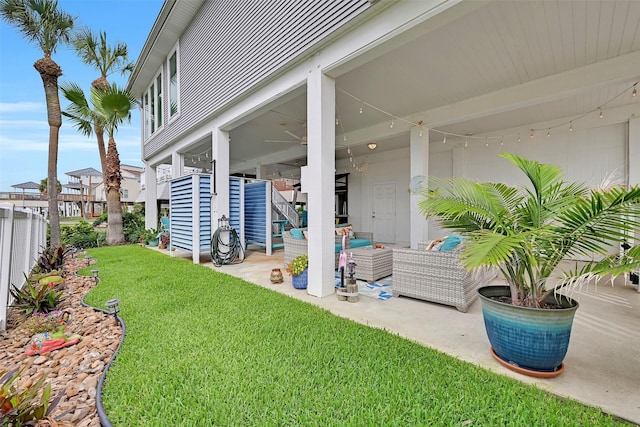 3906 Bridge Harbor Dr, Galveston, TX 77554 - view of yard featuring a patio and an outdoor living space