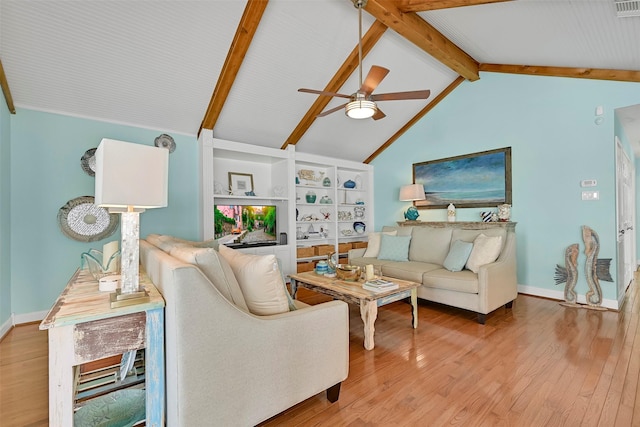 3906 Bridge Harbor Dr, Galveston, TX 77554 - living room with a ceiling fan, wood finished floors, and baseboards