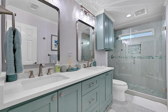 3906 Bridge Harbor Dr, Galveston, TX 77554 - bathroom with a shower stall, double vanity, toilet, ornamental molding, and recessed lighting