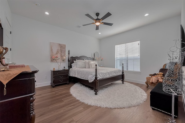 1305 E 27th St Unit A, Houston, TX 77009 - bedroom featuring wood finished floors, baseboards, a ceiling fan, and recessed lighting