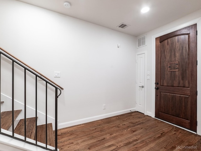 1224 Thompson, Houston, TX 77007 - entrance foyer with wood finished floors, baseboards, stairs, and recessed lighting