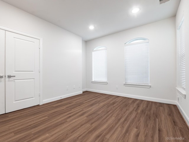 1224 Thompson, Houston, TX 77007 - spare room with wood finished floors, baseboards, recessed lighting, and plenty of natural light