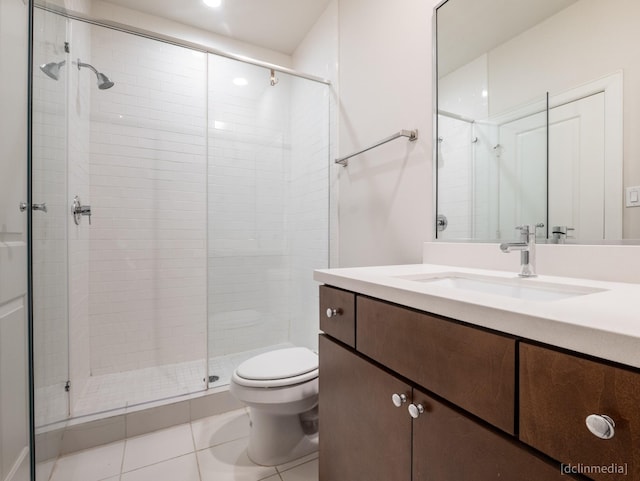 1224 Thompson, Houston, TX 77007 - full bathroom featuring vanity, a stall shower, toilet, tile patterned flooring, and recessed lighting