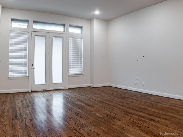 1224 Thompson, Houston, TX 77007 - doorway to outside with dark wood-style flooring, baseboards, and recessed lighting