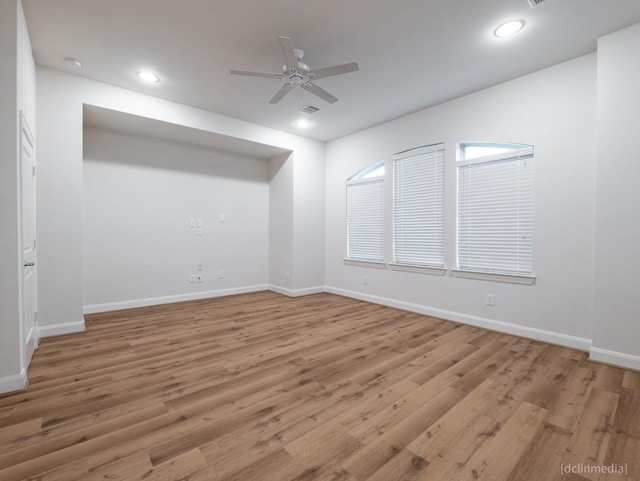 1224 Thompson, Houston, TX 77007 - unfurnished room featuring a ceiling fan, baseboards, light wood-style flooring, and recessed lighting