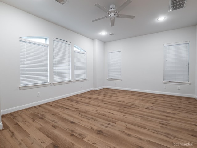 1224 Thompson, Houston, TX 77007 - unfurnished room featuring a ceiling fan, baseboards, wood finished floors, and recessed lighting