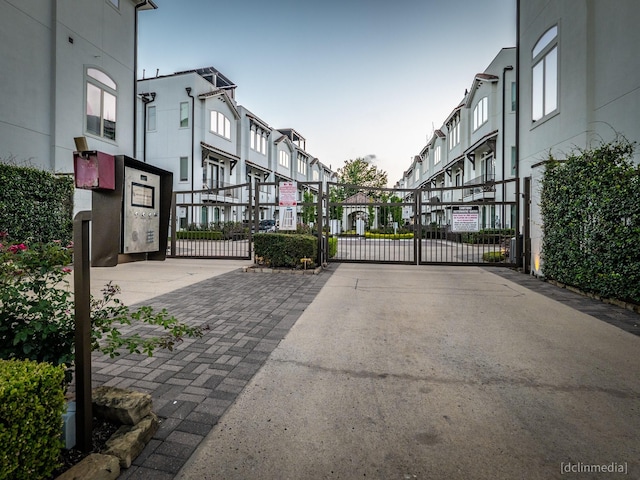 1224 Thompson, Houston, TX 77007 - view of asphalt street with a gate and a gated entry