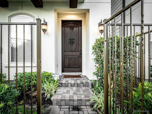 1224 Thompson, Houston, TX 77007 - entrance to property featuring stucco siding