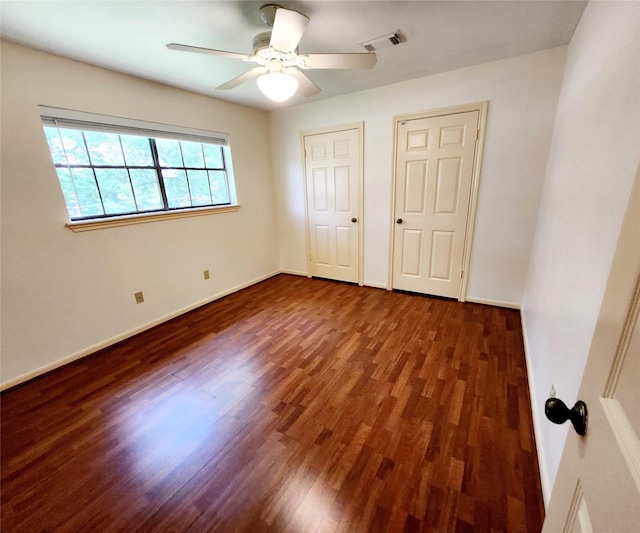 15903 Ridge Park Dr, Houston, TX 77095 - unfurnished bedroom featuring wood finished floors, baseboards, and ceiling fan