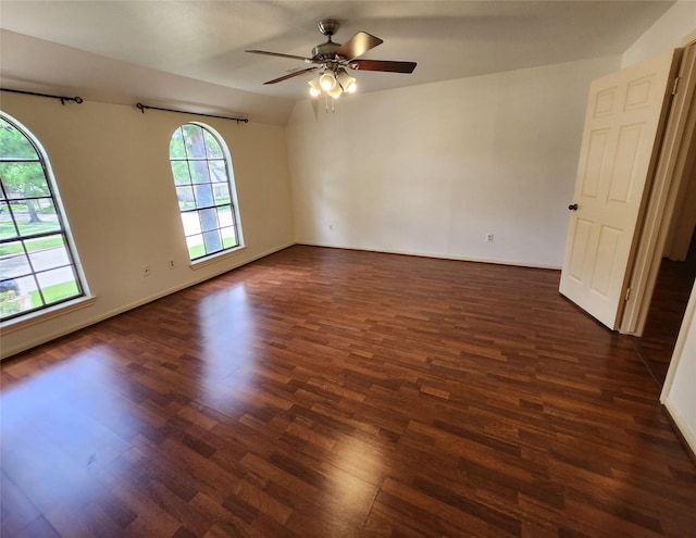 15903 Ridge Park Dr, Houston, TX 77095 - spare room with healthy amount of natural light, dark wood-style floors, a ceiling fan, and baseboards