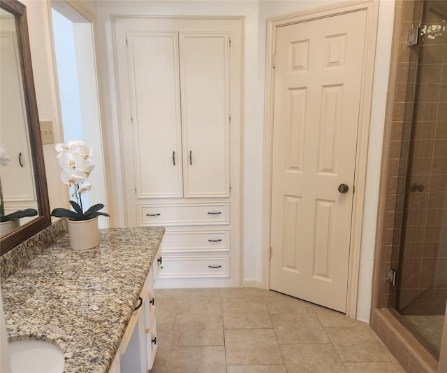 15903 Ridge Park Dr, Houston, TX 77095 - bathroom featuring vanity, a stall shower, and tile patterned floors