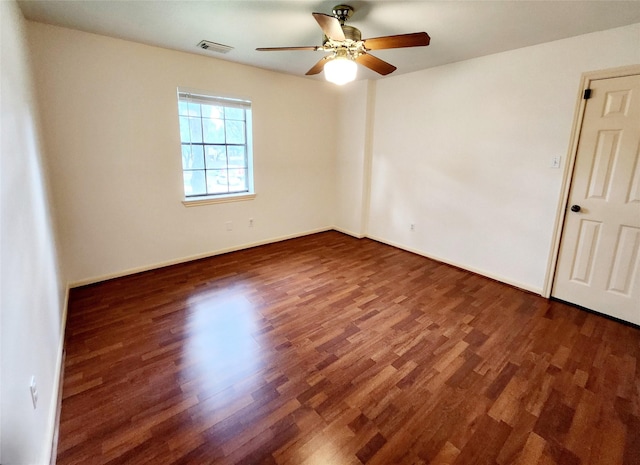 15903 Ridge Park Dr, Houston, TX 77095 - spare room with wood finished floors, a ceiling fan, and baseboards