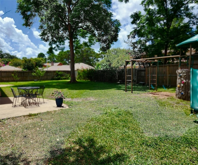 15903 Ridge Park Dr, Houston, TX 77095 - view of yard with a playground and a patio