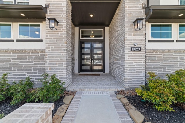 11023 White Caterpillar Dr, Cypress, TX 77433 - doorway to property featuring french doors and brick siding