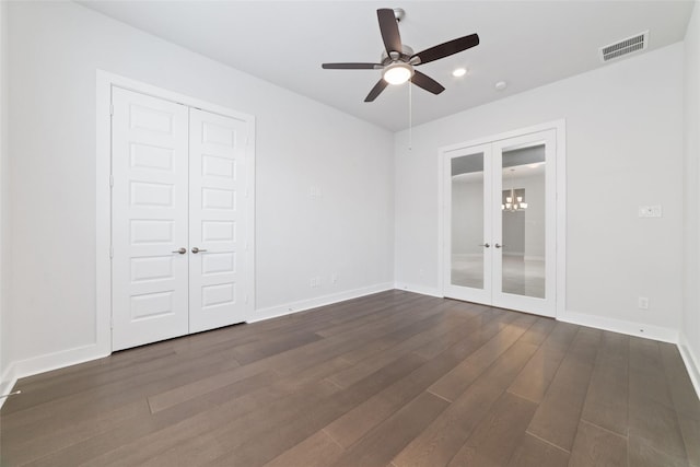 11023 White Caterpillar Dr, Cypress, TX 77433 - unfurnished bedroom featuring french doors, dark wood finished floors, baseboards, recessed lighting, and a ceiling fan
