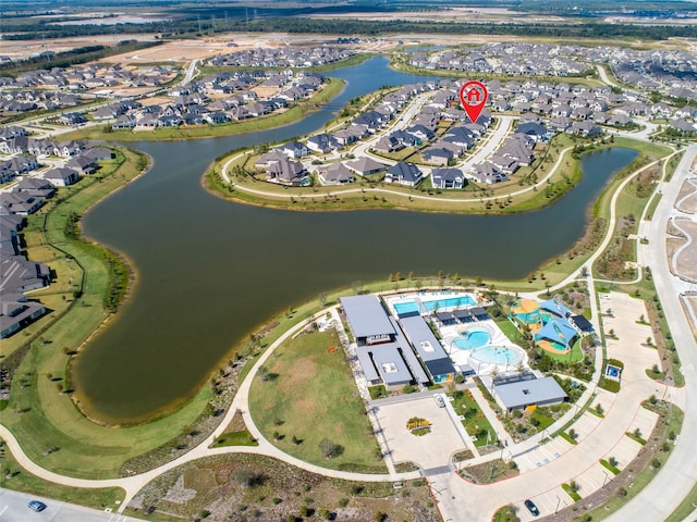 11023 White Caterpillar Dr, Cypress, TX 77433 - aerial overview of property's location featuring a large body of water, nearby suburban area, and a pool area