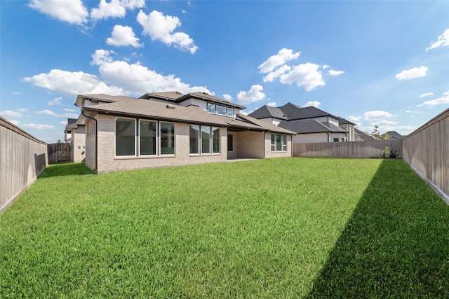 11023 White Caterpillar Dr, Cypress, TX 77433 - back of house with brick siding and roof with shingles