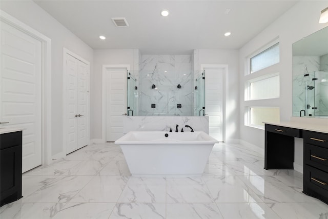 11023 White Caterpillar Dr, Cypress, TX 77433 - full bath featuring vanity, a marble finish shower, marble finish floors, a soaking tub, and recessed lighting