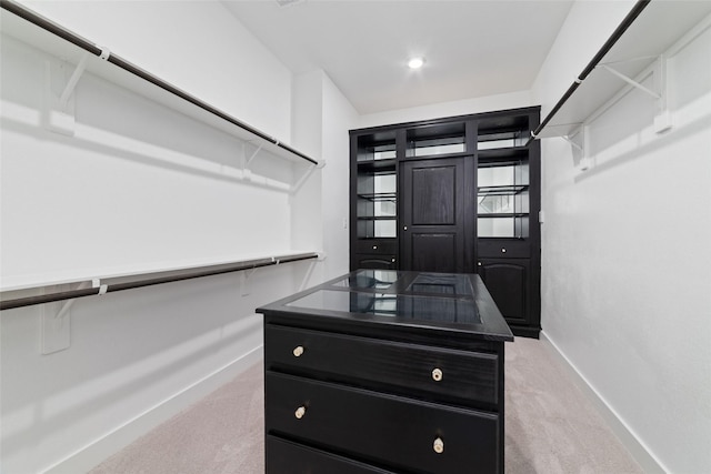 11023 White Caterpillar Dr, Cypress, TX 77433 - walk in closet featuring light carpet