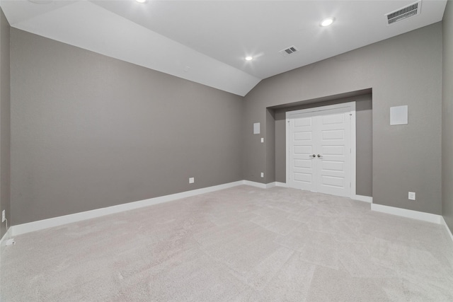 11023 White Caterpillar Dr, Cypress, TX 77433 - unfurnished bedroom featuring light carpet, recessed lighting, vaulted ceiling, baseboards, and a closet