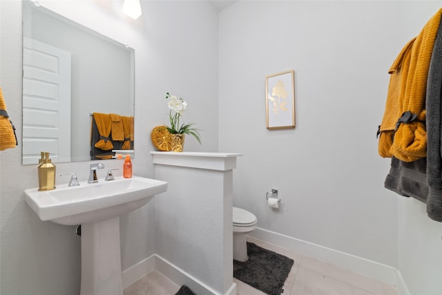11023 White Caterpillar Dr, Cypress, TX 77433 - half bath featuring toilet, baseboards, and tile patterned flooring