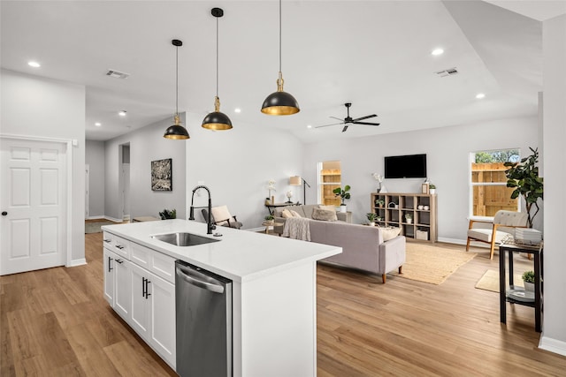 14307 Laredo St, Houston, TX 77015 - kitchen featuring dishwasher, a ceiling fan, light wood-type flooring, recessed lighting, and white cabinetry