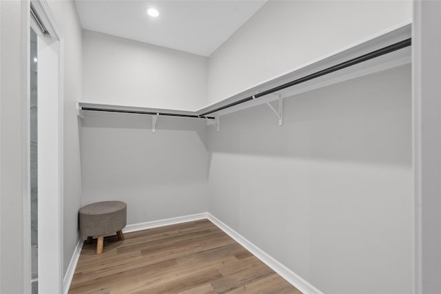 14307 Laredo St, Houston, TX 77015 - walk in closet featuring wood finished floors