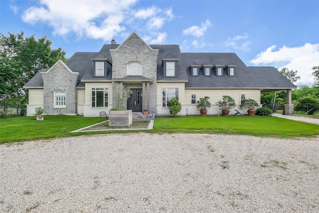 4002 Old Chocolate Bayou Rd Unit Cr89, Manvel, TX 77578 - french country inspired facade with stone siding, a front lawn, and a chimney
