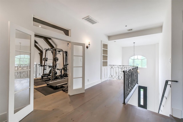 4002 Old Chocolate Bayou Rd Unit Cr89, Manvel, TX 77578 - corridor with an upstairs landing, wood finished floors, and baseboards