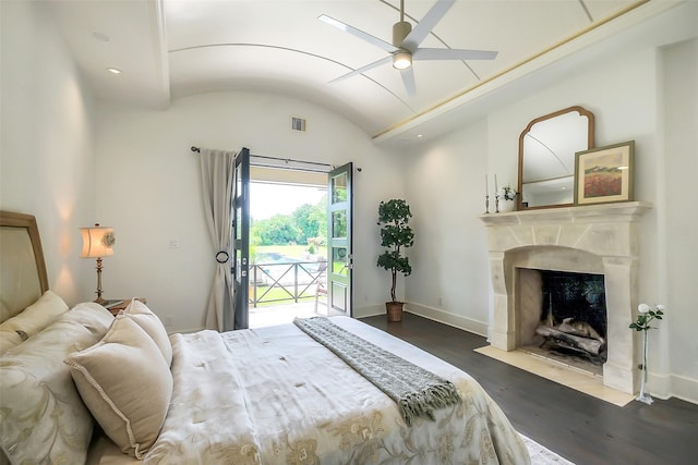 4002 Old Chocolate Bayou Rd Unit Cr89, Manvel, TX 77578 - bedroom featuring access to outside, wood finished floors, vaulted ceiling, a premium fireplace, and baseboards